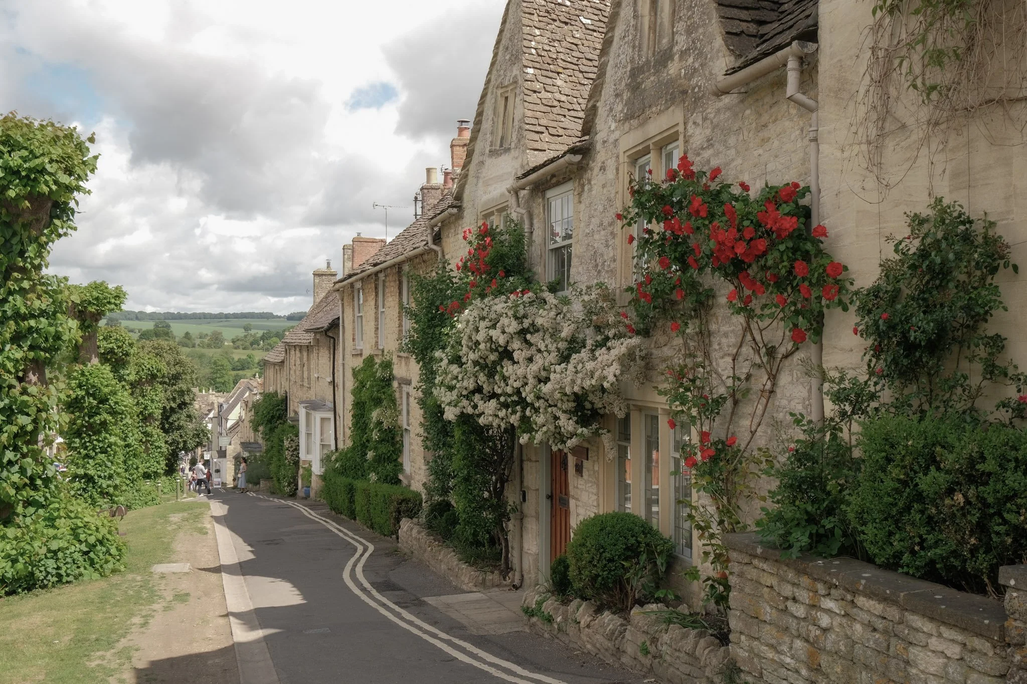 Honey-stone cottages in a quintessential Cotswolds village