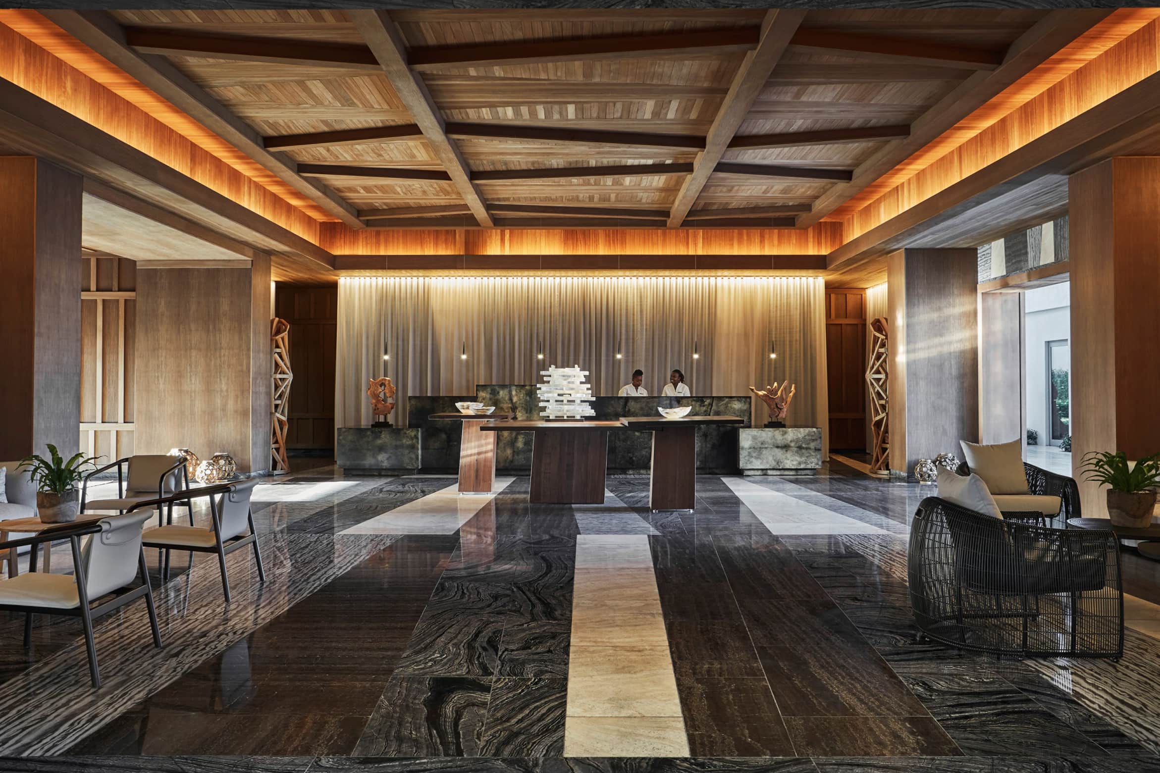 Luxury boutique hotel interior — warm, considered design